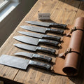 Hammer Forged 7-Piece Damascus Chef Knife Set with Black Pakkawood Handles & Leather Carry Roll
